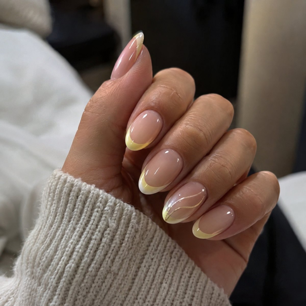 Yellow French tip line detail nails