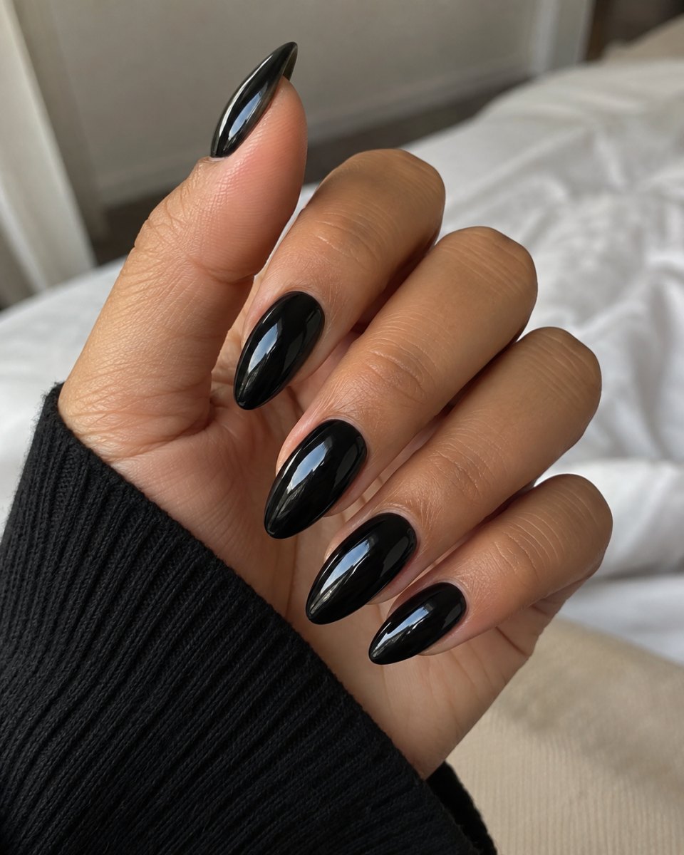 Glossy nude almond nails
